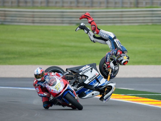 Jorge Lorenzo becomes airborne trying to avoid backmarker James Ellison.