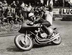 John Surtees rides his MV Agusta to victory at the 1958 Isle of Man TT.