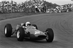 Surtees pushes the Ferrari 158 to second place behind Jim Clark’s Lotus at Zandvoort in Holland 1964.